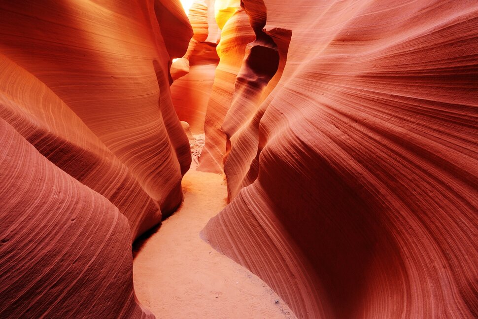 Layered sandstone walls of Antelope Canyon, Arizona — natural waves shaped by time.